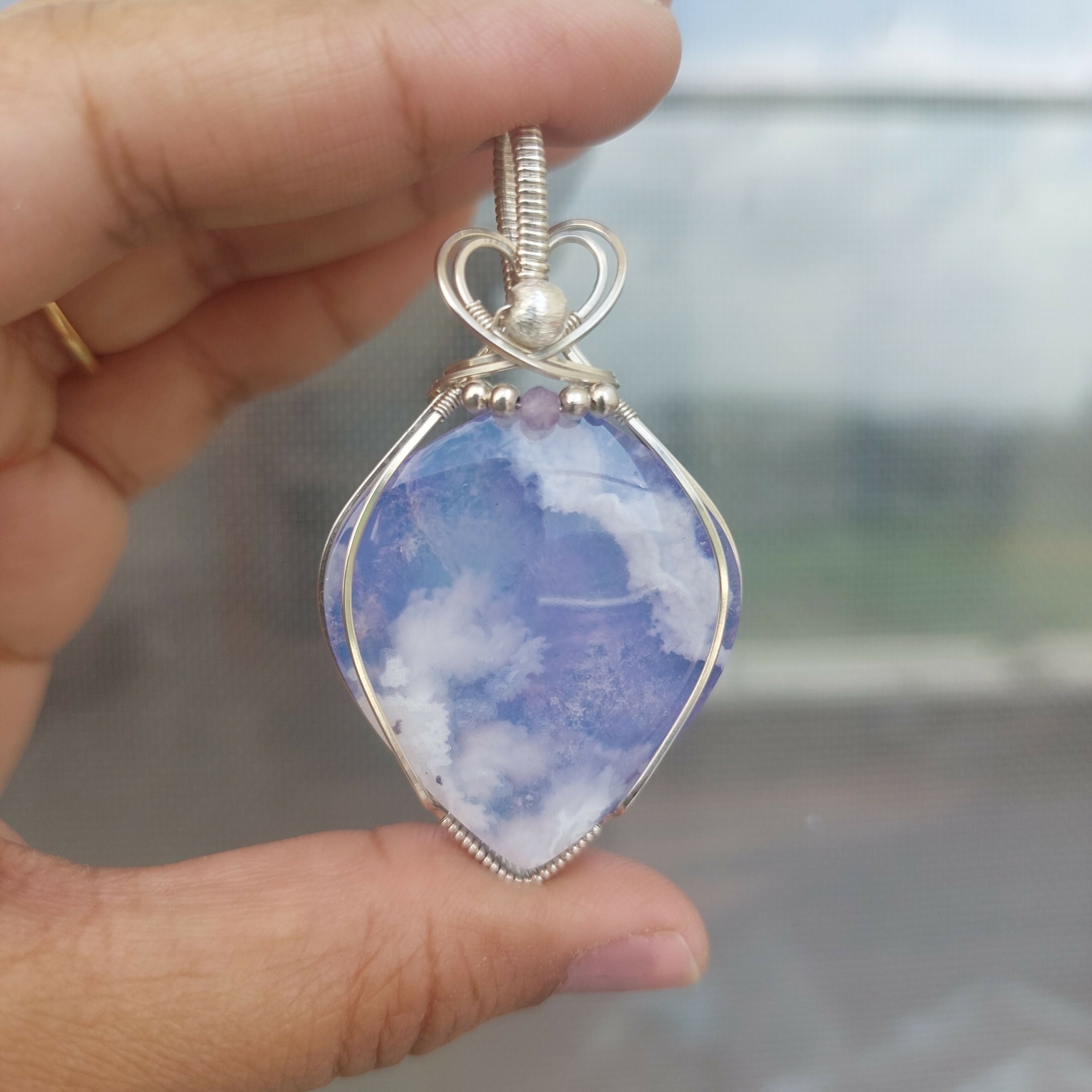A piece of sky- aurora effect- plume agate doublet sterling silver wire wrapped handmade pendant