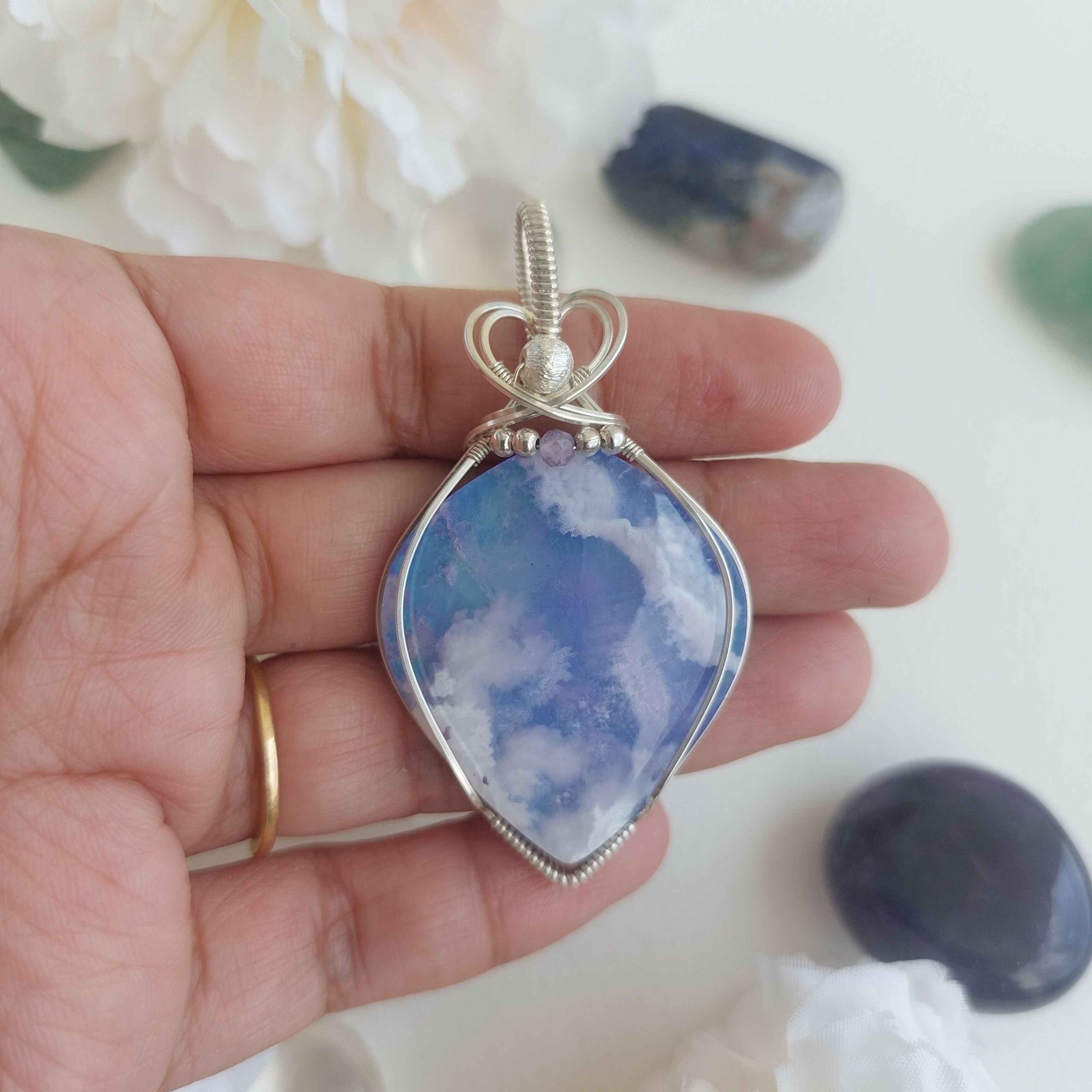 A piece of sky- aurora effect- plume agate doublet sterling silver wire wrapped handmade pendant