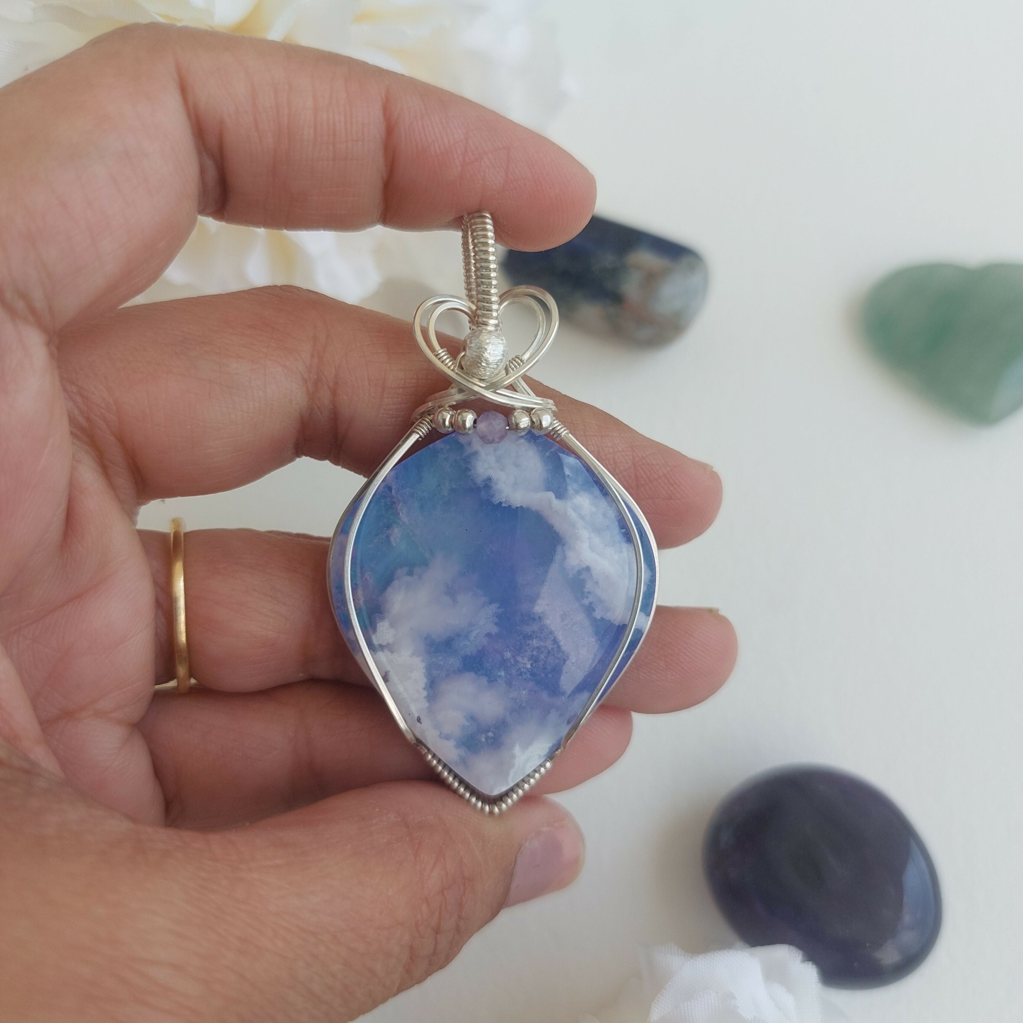 A piece of sky- aurora effect- plume agate doublet sterling silver wire wrapped handmade pendant