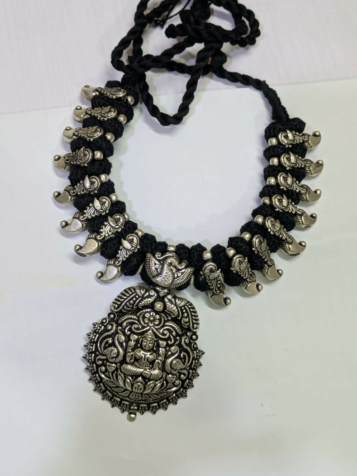 Oxidised Lakshmi Pendant necklace with Kolhapuri Charms