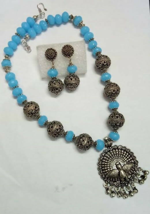 Sky Blue Rondelles with Oxidised Peacock Pendant with Ghungroos